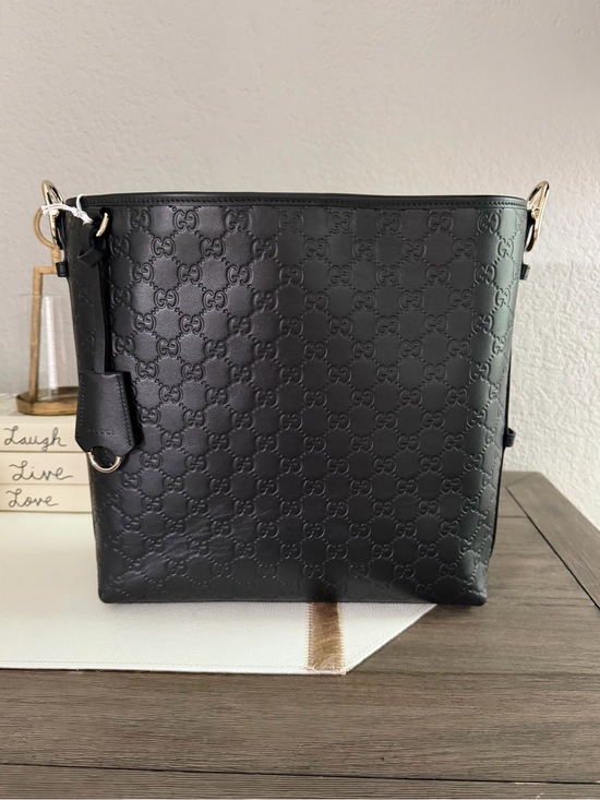 Gucci Handbags - Gucci Black Embossed GG Leather Shoulder Bag